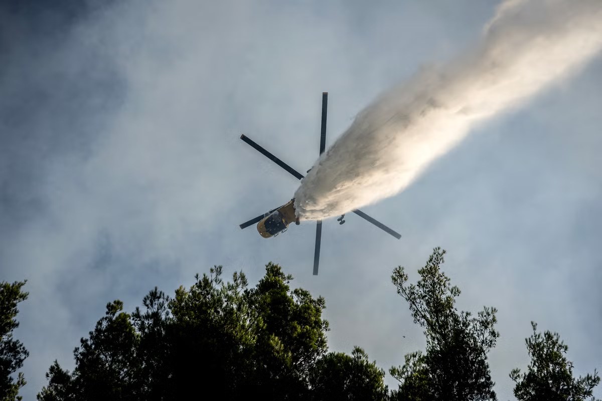 Two helicopters collide as Greece battles wildfires, Hungary shuts nuclear plant