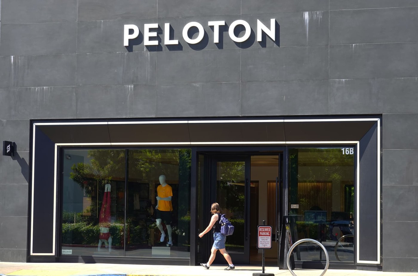 Peloton posts first-ever annual net profit, but shares drop as outlook disappoints