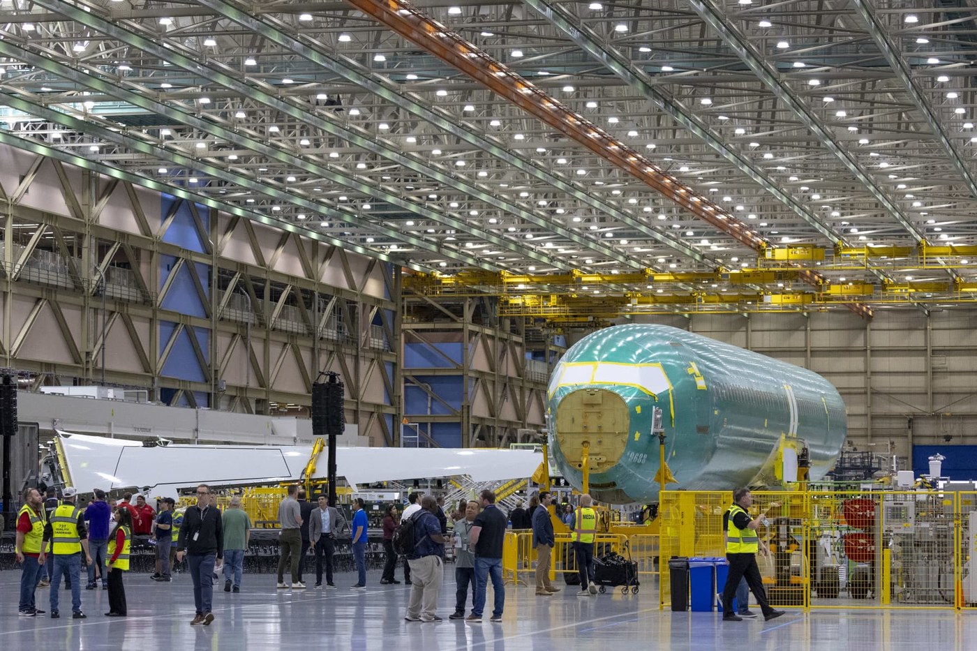 Boeing narrows third-quarter loss as defense sales rise, but focus remains on 737 Max production